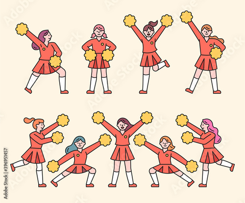 The cheerleaders are cheering with Pom Pom. flat design style minimal vector illustration.