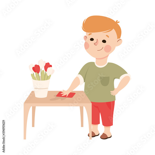 Cute Boy Wiping Dust From Table, Kid Helping his Parents with Housework or Doing Household Chores Cartoon Style Vector Illustration