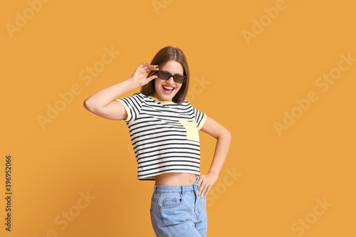 Happy woman with stylish su...