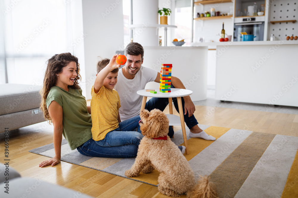 Happy family having fun time at home Happy family having fun time at home