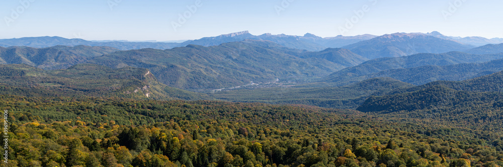 Panoramic view over mountains covered by forest Panoramic view over mountains covered by forest