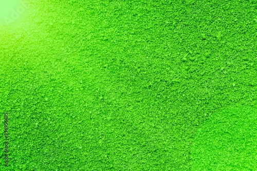Lawn texture with sun ray. Fresh lawn