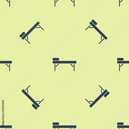 Blue Massage table icon isolated seamless pattern on yellow background. Vector.