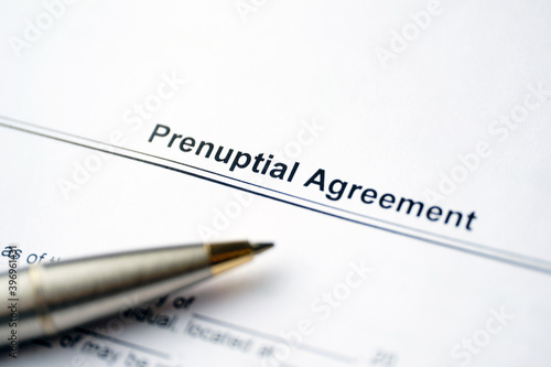 Legal document Prenuptial Agreement on paper near pen