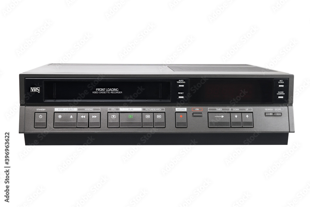 Old videocassette recorder 1980s-1990s with videotape isolated on white background. foreground Old videocassette recorder 1980s-1990s with videotape isolated on white background. foreground