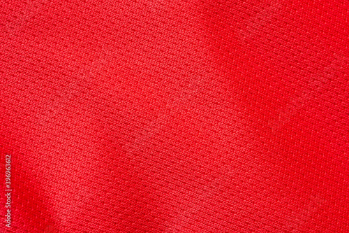 Red sports clothing fabric football shirt jersey texture background