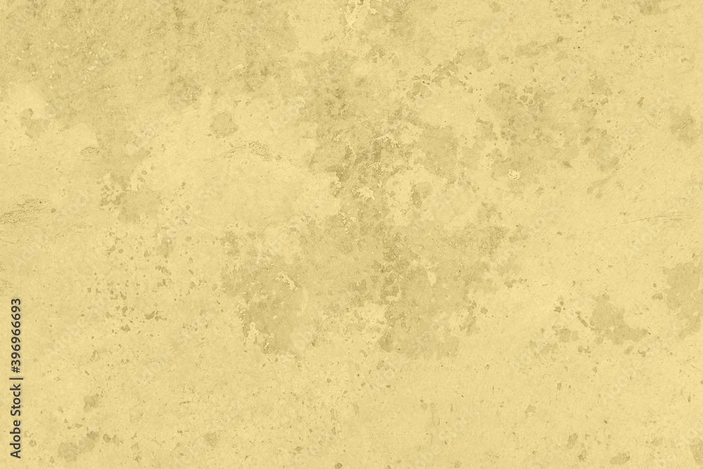 Pastel colored yellow low contrast Concrete textured background with roughness and irregularities. 2021-2022 color trend.
