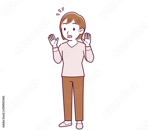 ピンクの長袖の若い女性