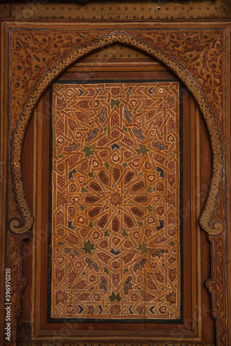 Arabic decoration on a wooden door. Exotic design from Morocco. 