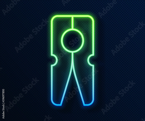 Glowing neon line Old wood clothes pin icon isolated on blue background. Clothes peg. Vector.