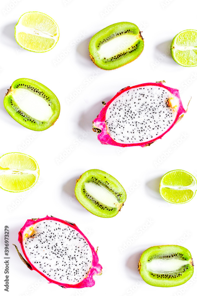 pattern with sliced kiwi and pitaya on white background top view pattern with sliced kiwi and pitaya on white background top view