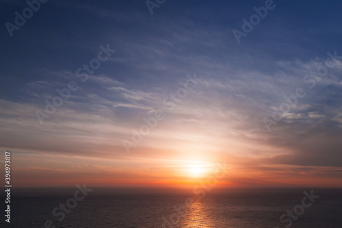 Colorful sky at sunset, natural photo background © evannovostro