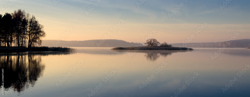  landscape with sunrise and sunset on a pond. panorama with water landscape