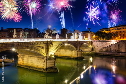 Fireworks display over twe Saint Angelo Bridge in Rome, Italy