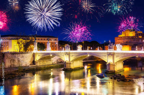 Photography Fireworks display over twe Saint Angelo Bridge in Rome, Italy
