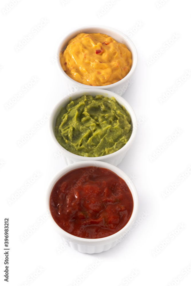 Traditional Mexican sauces. Guacamole, chilli pepper sauce and cheese sauce isolated on white background Traditional Mexican sauces. Guacamole, chilli pepper sauce and cheese sauce isolated on white background