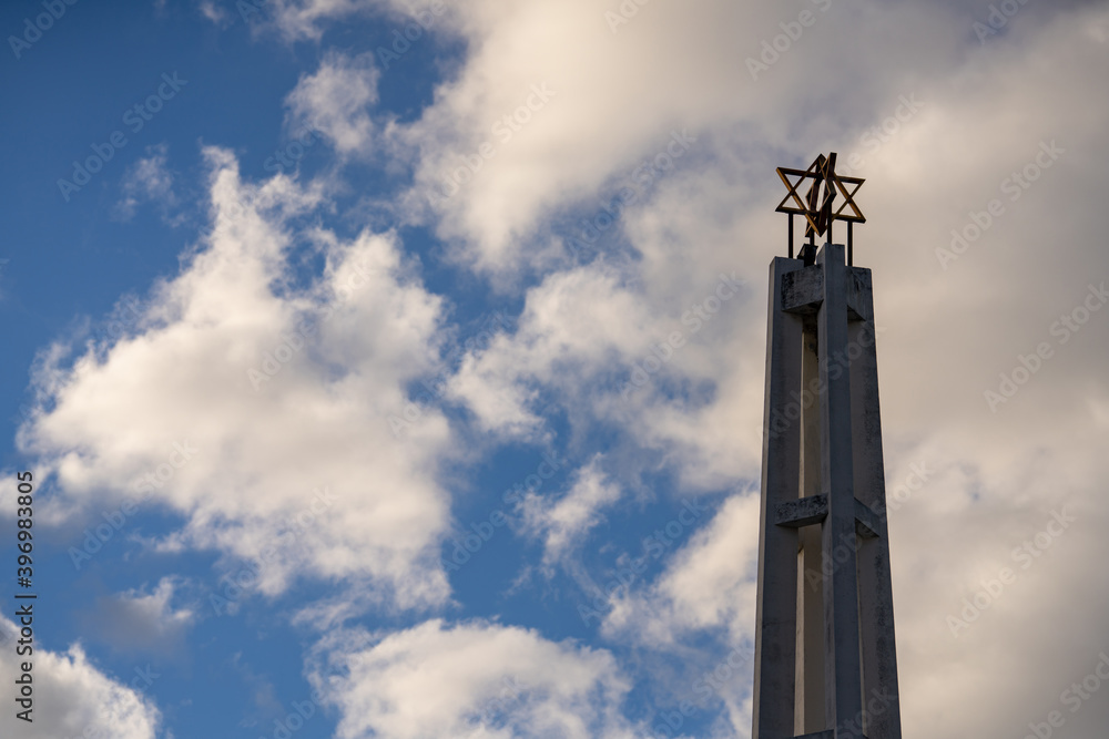 Jewish religious icon Star of David on sky background Jewish religious icon Star of David on sky background
