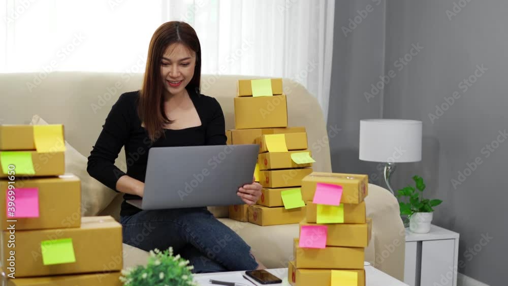 cheerful woman entrepreneur working with laptop computer and success to selling product online at home office, (SME business) cheerful woman entrepreneur working with laptop computer and success to selling product online at home office, (SME business)