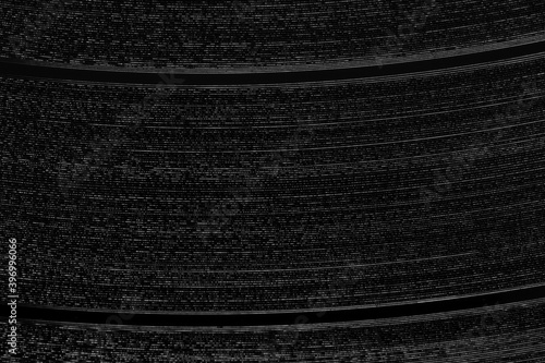 Background texture of grooves on retro vinyl record, close-up