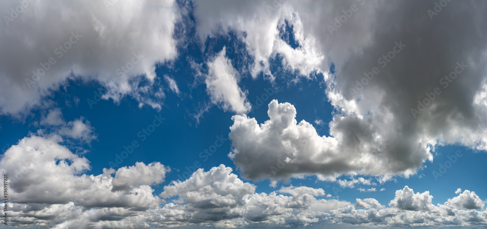 Fantastic clouds against blue sky, panorama Fantastic clouds against blue sky, panorama