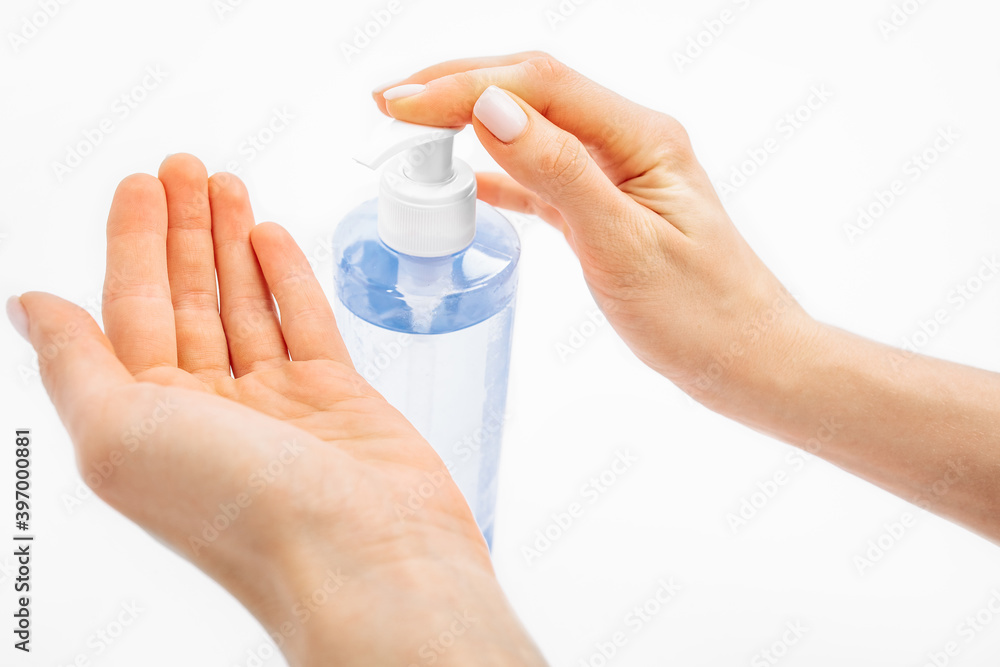 Disinfection of hands. hands applying antiseptic spray to prevent coronavirus or flu, on a white background, Disinfection of hands. hands applying antiseptic spray to prevent coronavirus or flu, on a white background,