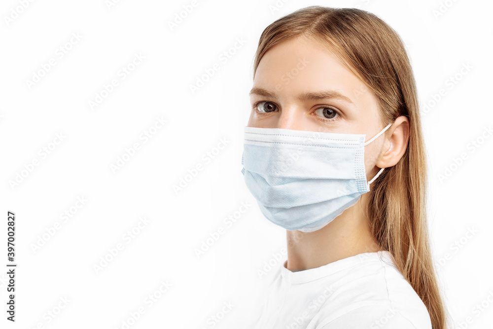 young woman in mask looking at camera, on isolated white background. Flu epidemic, coronavirus, virus protection young woman in mask looking at camera, on isolated white background. Flu epidemic, coronavirus, virus protection