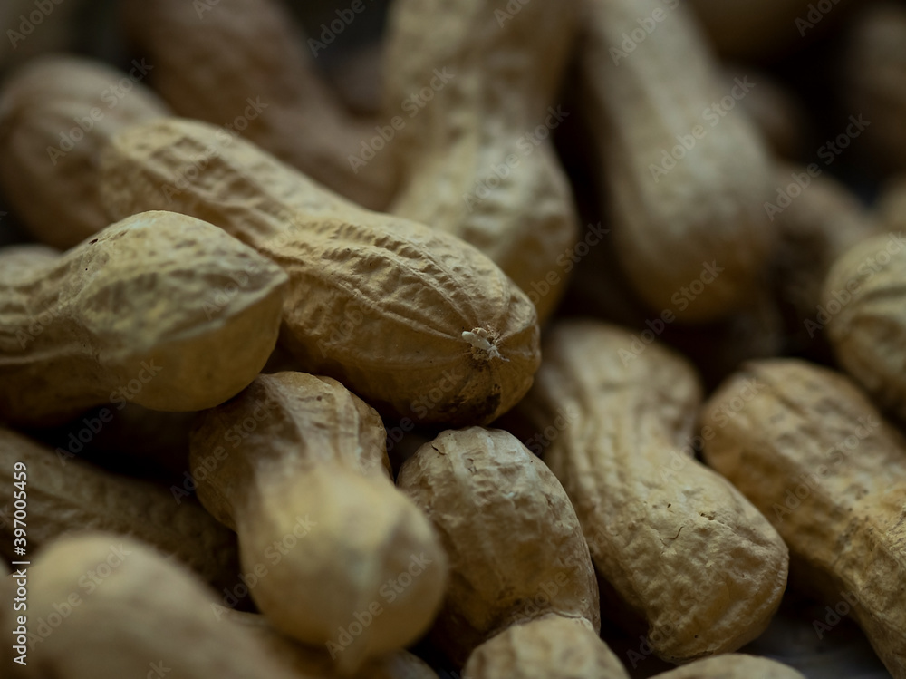peanuts on a wooden background peanuts on a wooden background