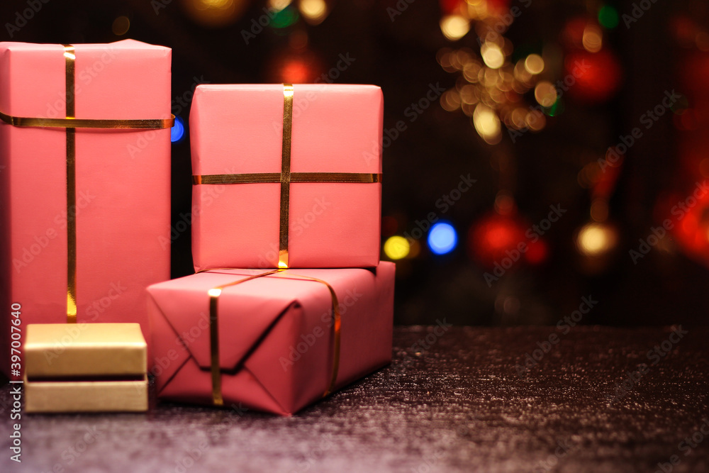 Gift boxes on new year's background with bokeh. Gift boxes on new year's background with bokeh.