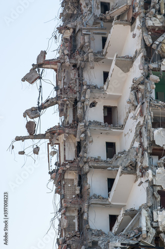 complete demolition destruction of a tall building completely ruined tall building