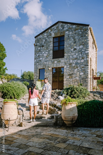 Agriturismo bed and breakfast at Sicily Italy, beautiful historical old farm renovated as BB Sicilia, a couple on vacation at Sicilian luxury agriturismo photo