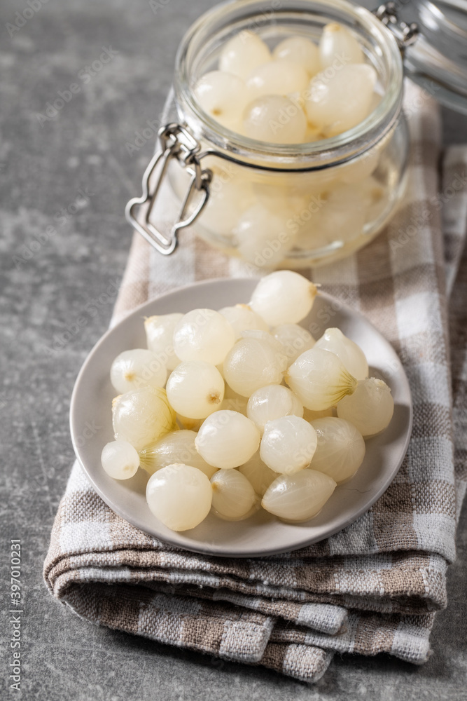 Pickled mini baby onions in jar Pickled mini baby onions in jar