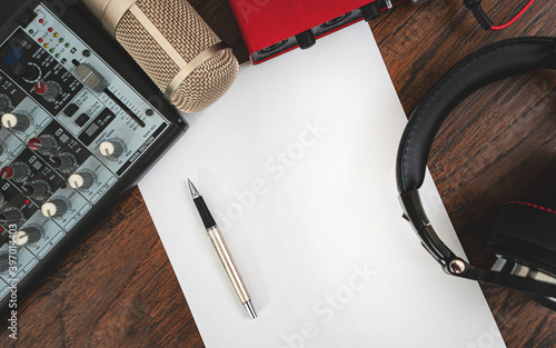 Fotografie Headphones, mixer console, microphone and sound card