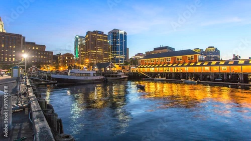 Panoramic timelapse of the old Halifax waterfront with its bustling restaurants and business & financial district in the backdrop of dynamic downtown at dusk. photo