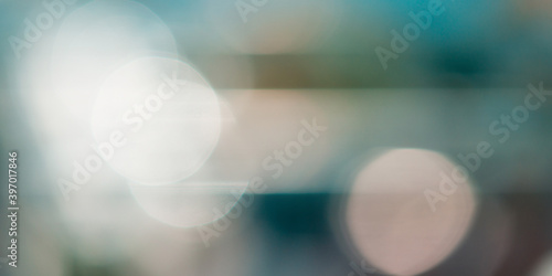 Abstract cinematic bokeh background, defocused light spots photo