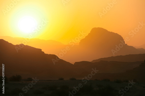 sunset in Wadi Rum, Jordan desert after a day hiking we enjoyed this view over the desolate mountains
