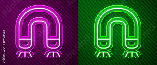 Glowing neon line Magnet icon isolated on purple and green background. Horseshoe magnet, magnetism, magnetize, attraction. Vector.