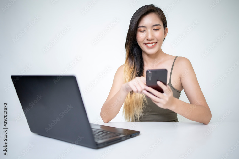 Asian women are doing online at the office. Asian women are doing online at the office.