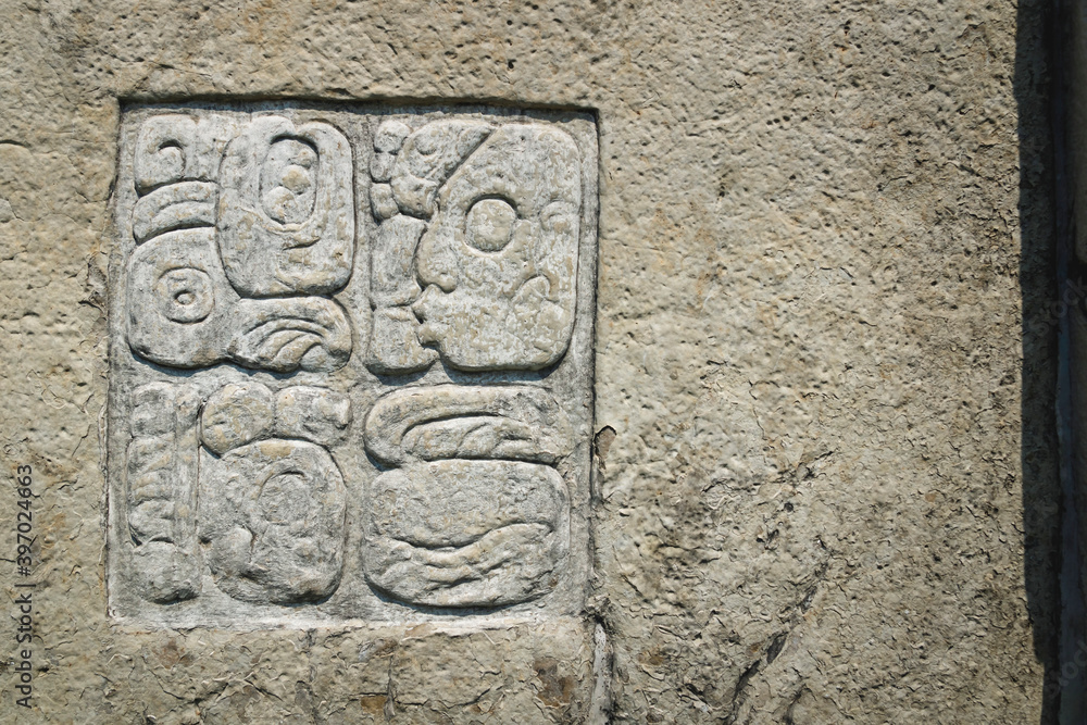 Basrelief carving of Mayan signs at the archaeological site of Palenque, Chiapas, Mexico