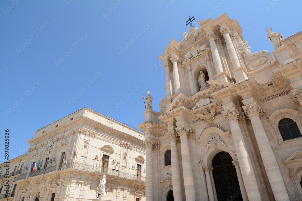 Syracuse is a city in Sicily where Archimedes was born. It is known for the ruins of antiquity. Here the Duomo in the peninsula of Ortigia which is the center city.