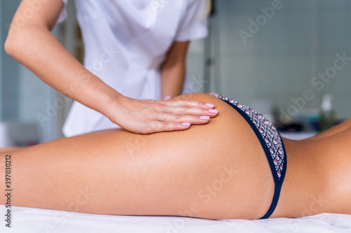 Legs and buttocks massage to reduce cellulite and phlebeurysm and preserve an healthy look. Skin and bodycare, recovery