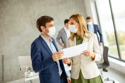 Man and woman with protecti...