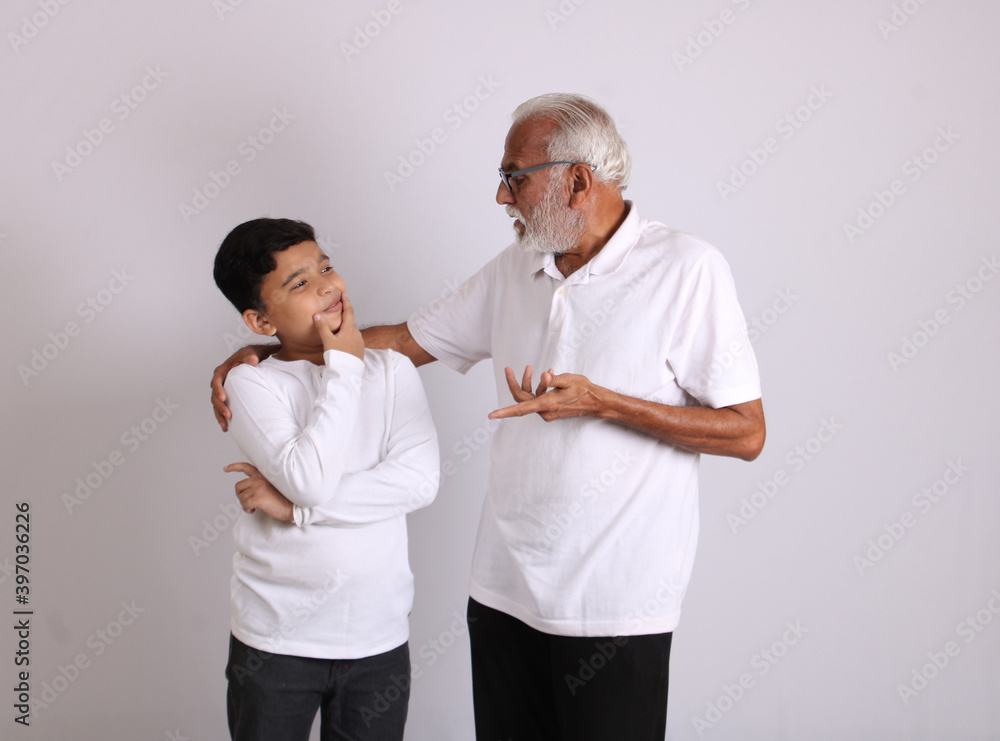 Happy Indian grandfather and grandson spending quality time Stock Photo |  Adobe Stock
