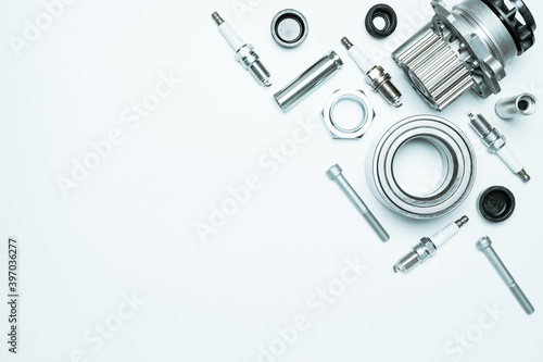Vehicle parts. Auto motor mechanic spare or automotive piece on white background. Set of new metal car part. Repair and vehicle service with space for text.