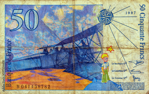 Portrait from French 50 Francs 1997 Banknotes. An Old paper banknote, vintage retro. Breguet XIV biplane. Famous ancient Banknotes. Collection. photo