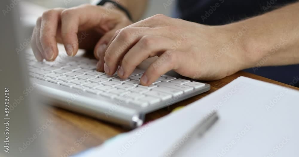 Male hands typing on a computer keyboard in the office 4k movie. Work at home freelance concept Male hands typing on a computer keyboard in the office 4k movie. Work at home freelance concept