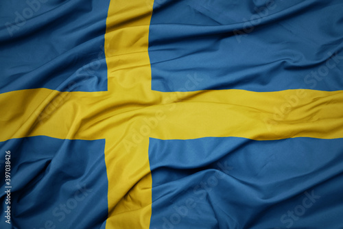 Fotografie waving colorful national flag of sweden.