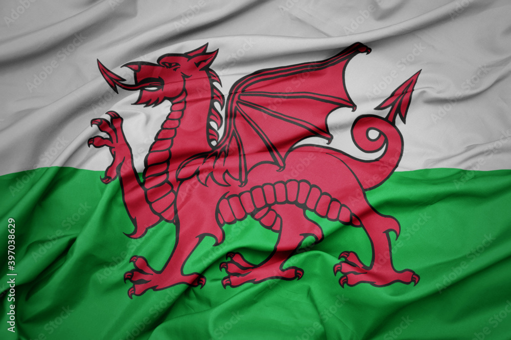 waving colorful national flag of wales. waving colorful national flag of wales.
