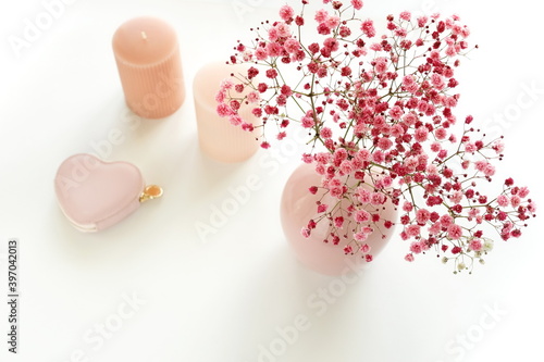 pink gypsophila flowers or baby's breath flowers bouquet in a vase, pink cand...
