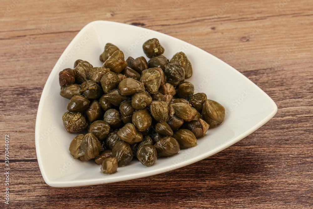 Tasty capers in the bowl Tasty capers in the bowl