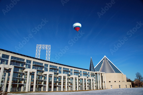 Ottawa City Hall and large Hot air balloon against a glowing blue sky photo